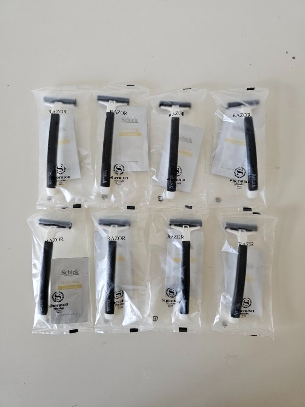 8 x Schick Dual Blade Disposable Razors with Cream - Individually Packed
